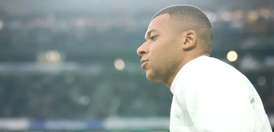 Player observing the match from the sidelines