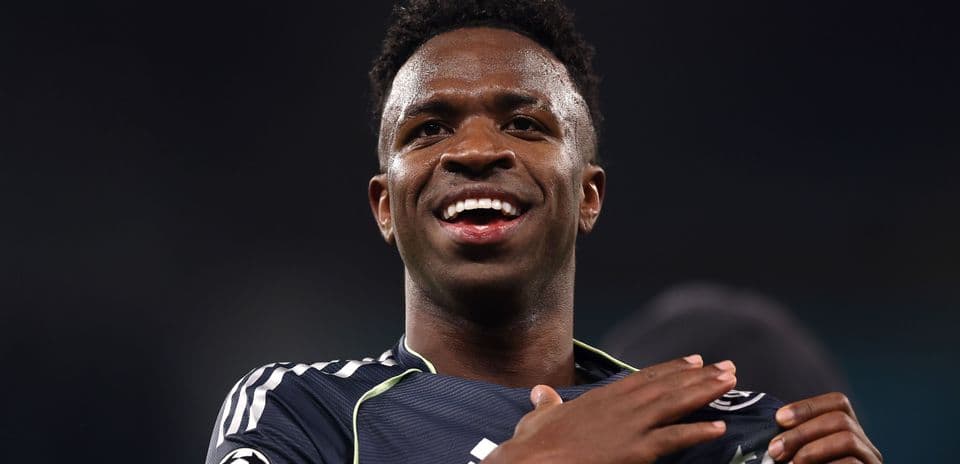 Player celebrating after a match, wearing team jersey