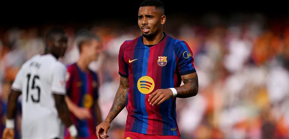 Barcelona player walking on the field during match