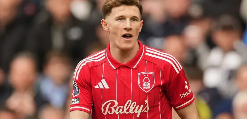 Player in red Nottingham Forest jersey during match