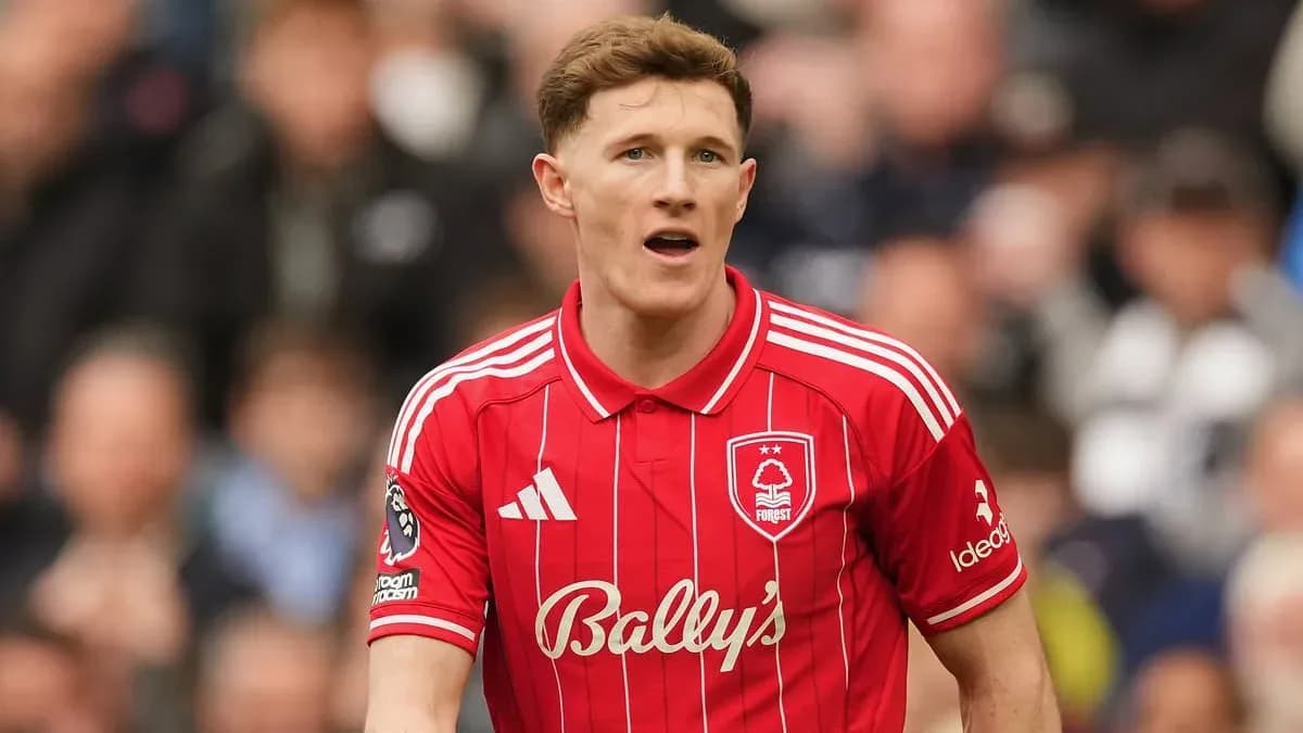 Player in red Nottingham Forest jersey during match
