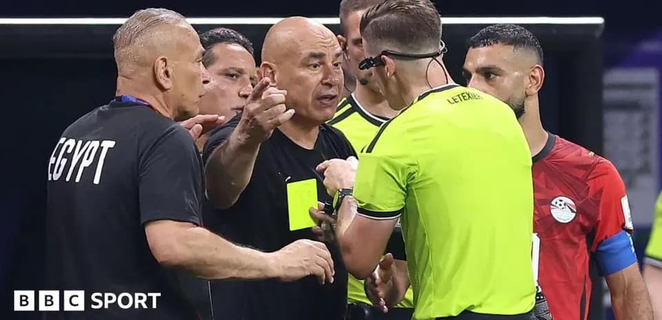 Coaches arguing with referee during match stoppage