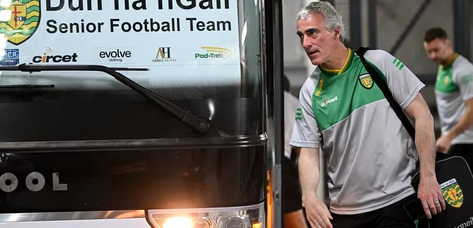Manager exiting bus for Dún na nGall team