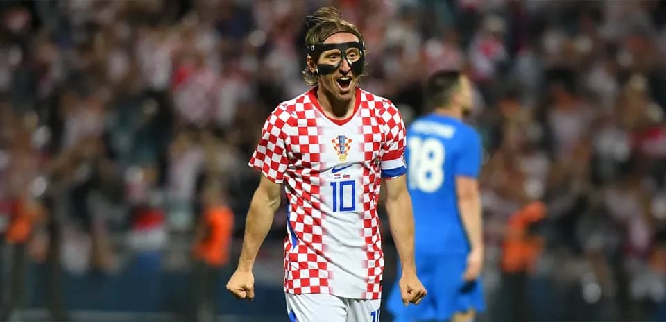 Croatian player celebrating in match with fans
