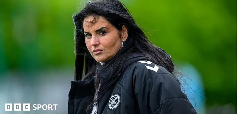 Coach observing training session in outdoor setting