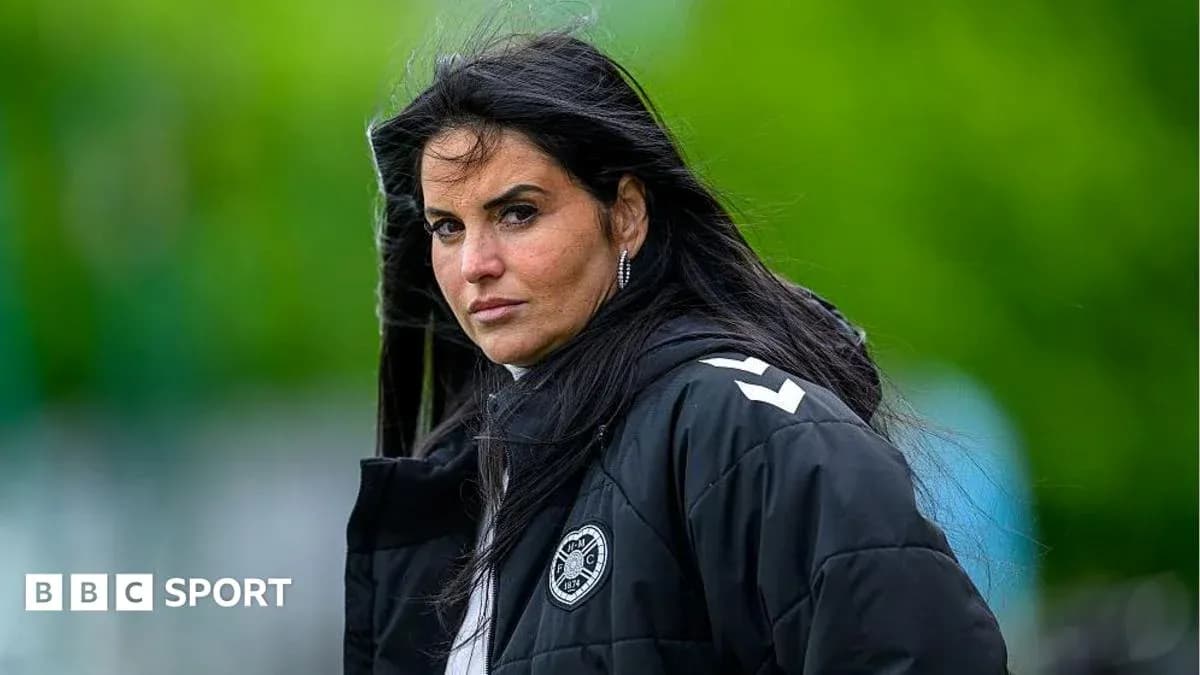 Coach observing training session in outdoor setting