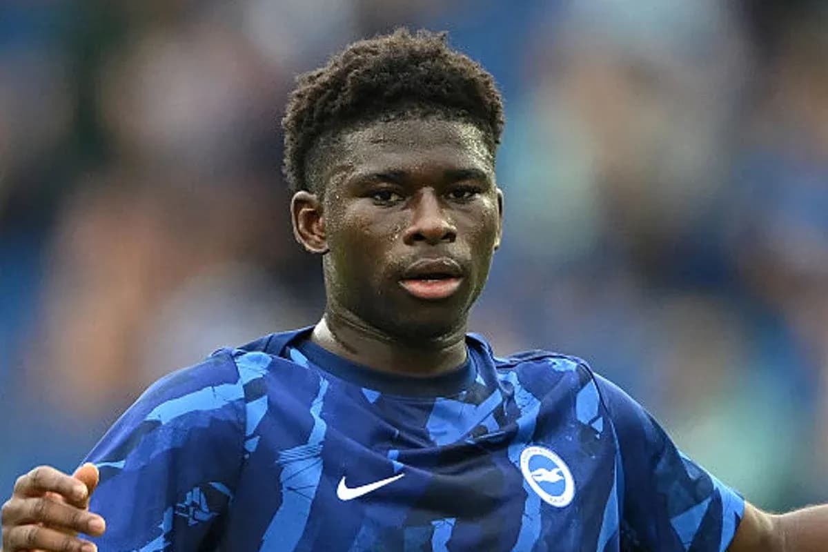 Player in blue kit during football match action