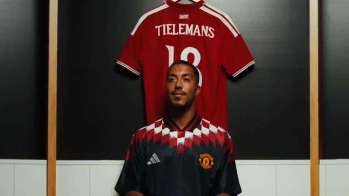 Player posing in Manchester United jersey with Tieleman’s shirt