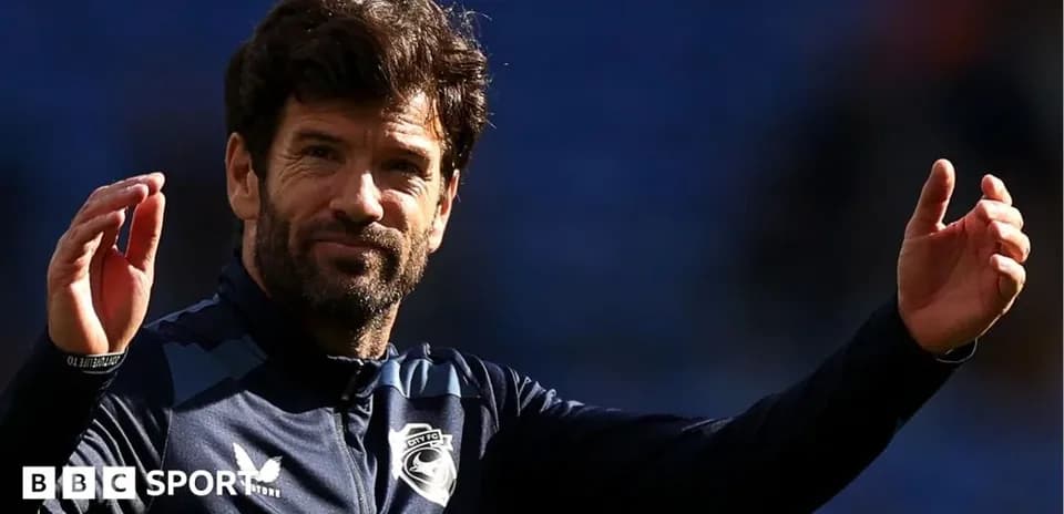Manager gesturing during match warm-up session