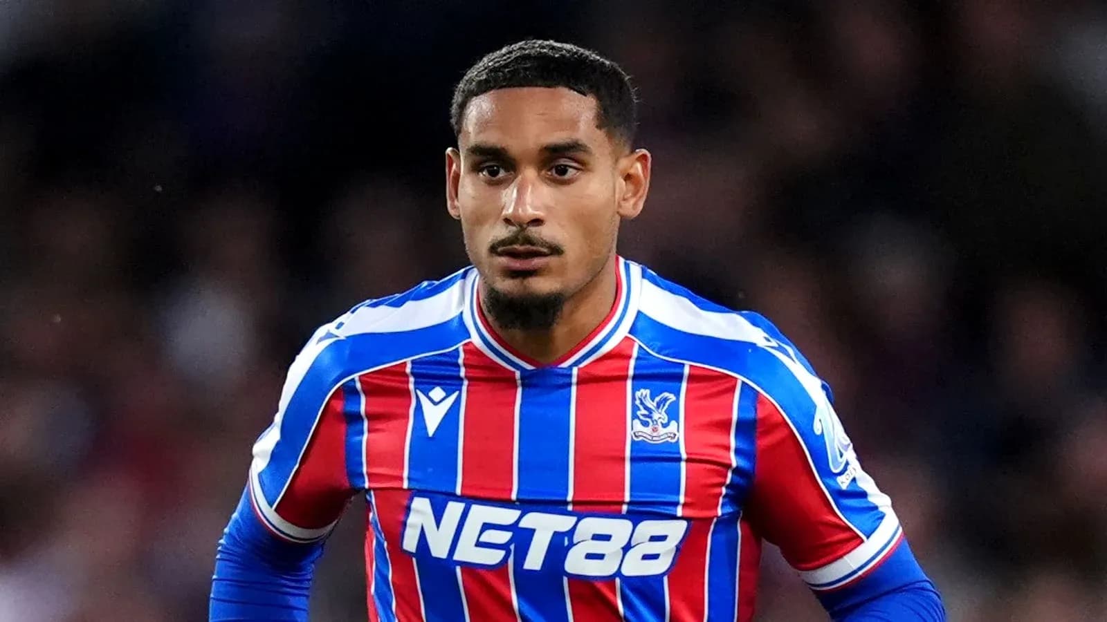 Player wearing Crystal Palace jersey on the field