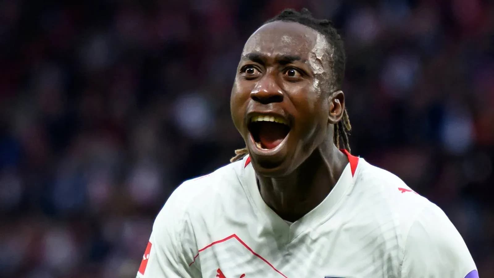 Player celebrating after scoring a goal during match