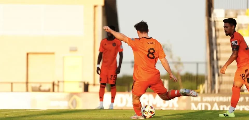 Player taking a free kick during match