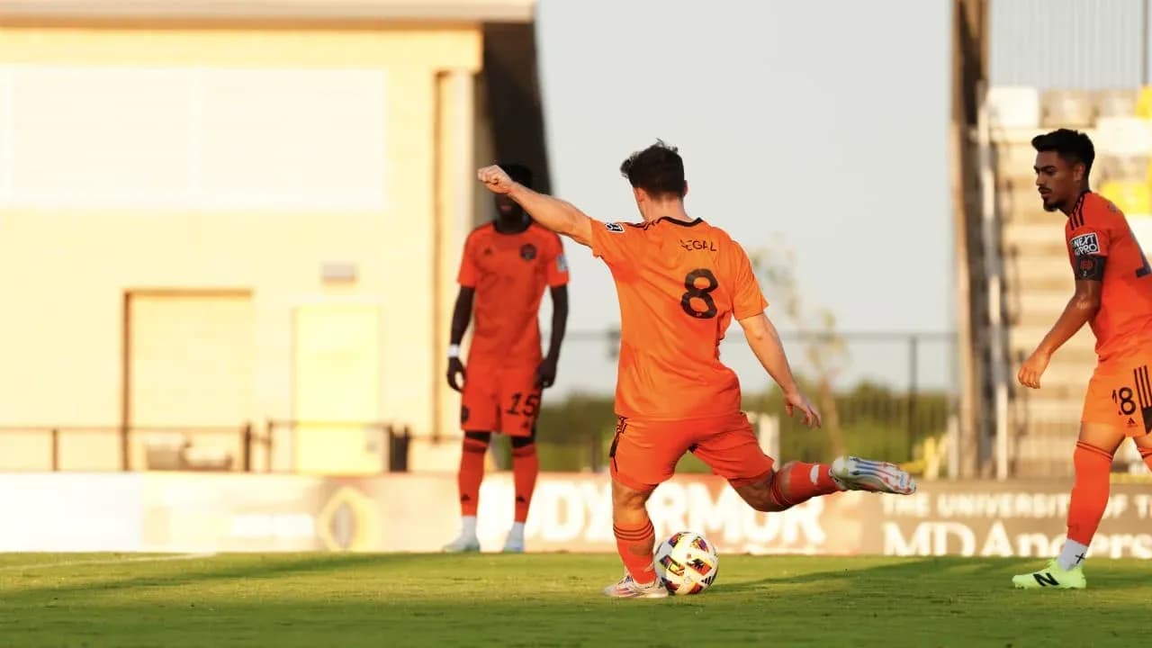 Player taking a free kick during match