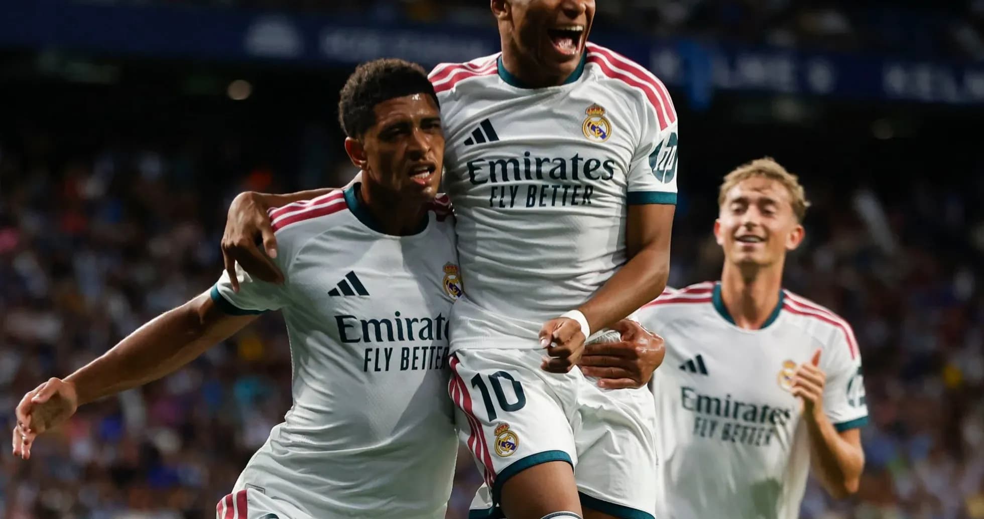 Real Madrid players celebrating a goal together