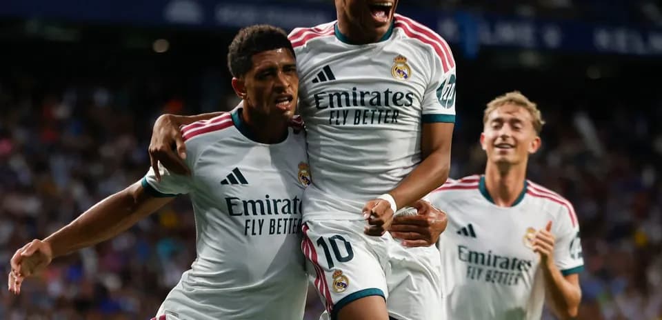 Real Madrid players celebrating a goal together
