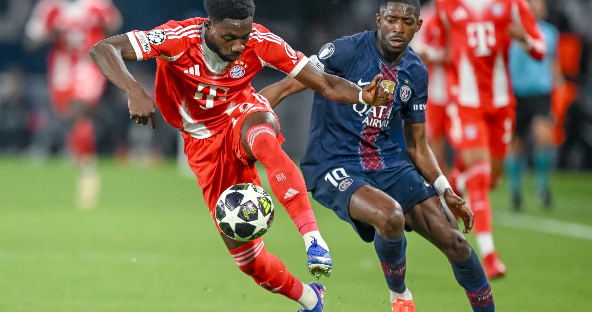 Player competing for the ball in Champions League match
