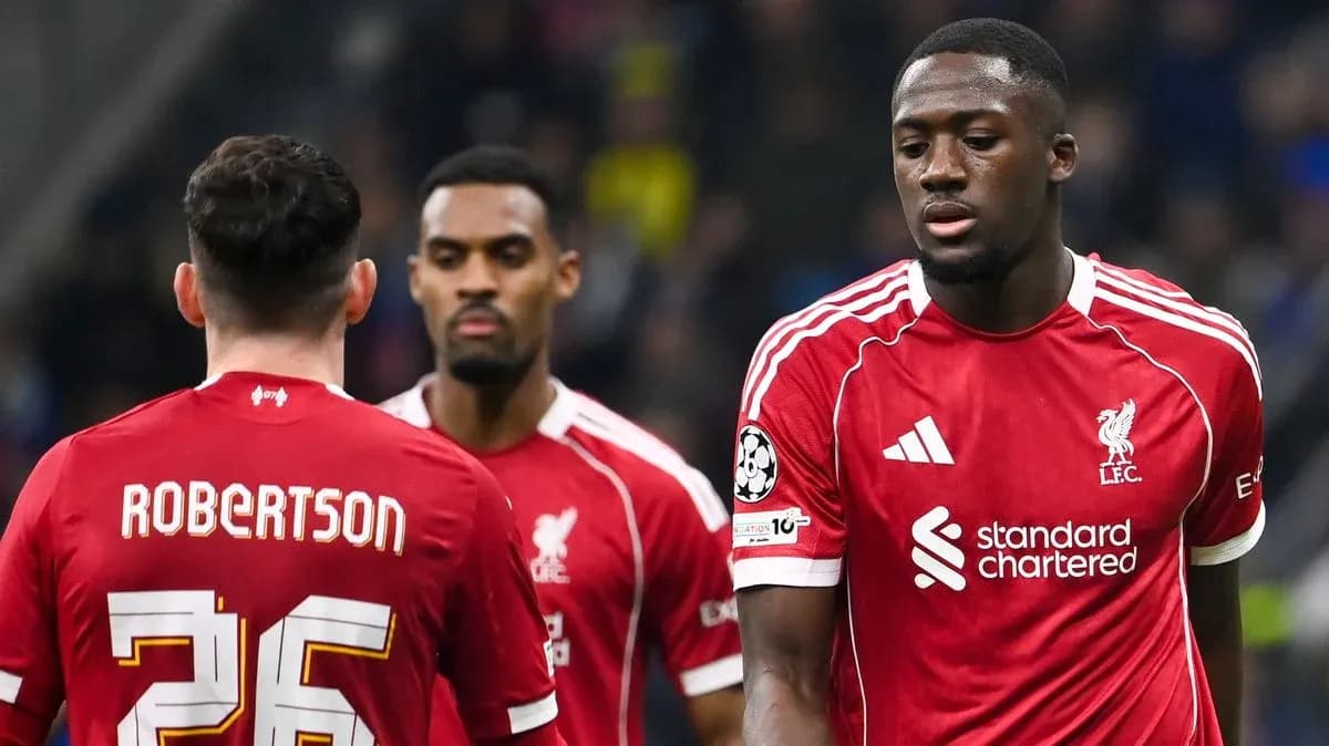 Liverpool players walking on the pitch during match