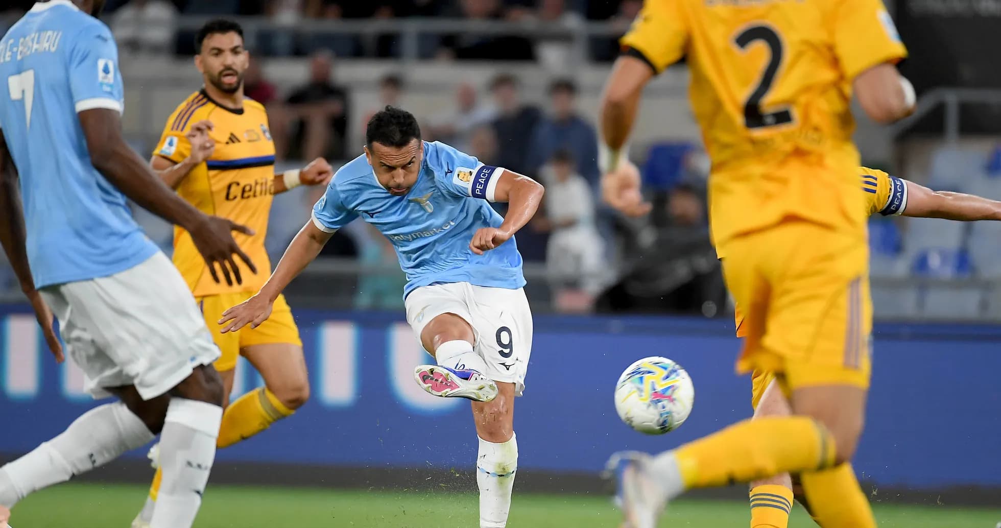Lazio player kicking the ball during match