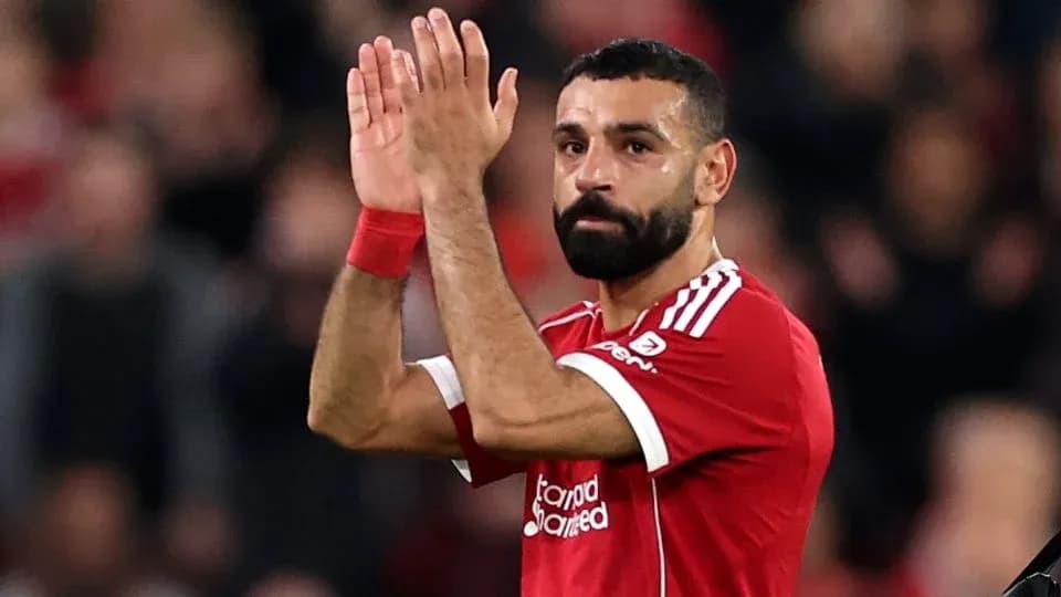 Player applauding fans after the match