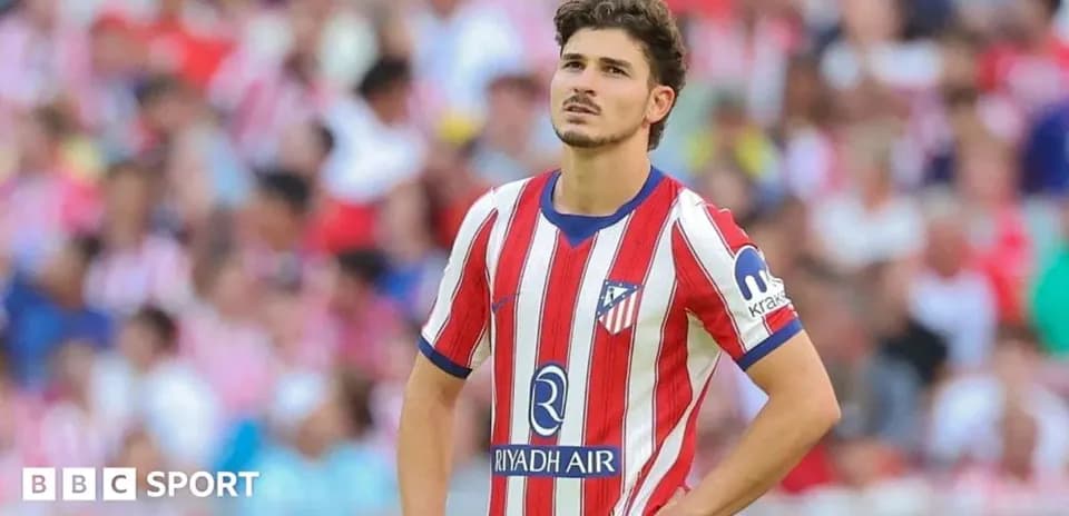 Atletico Madrid player looking up during match