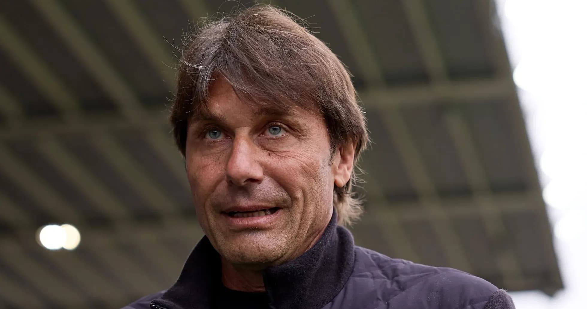 Football manager speaking at an event