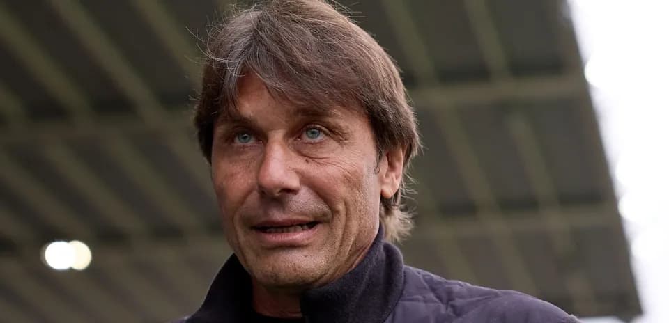 Football manager speaking at an event