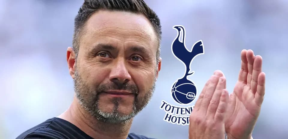 Coach applauding with Tottenham Hotspur logo