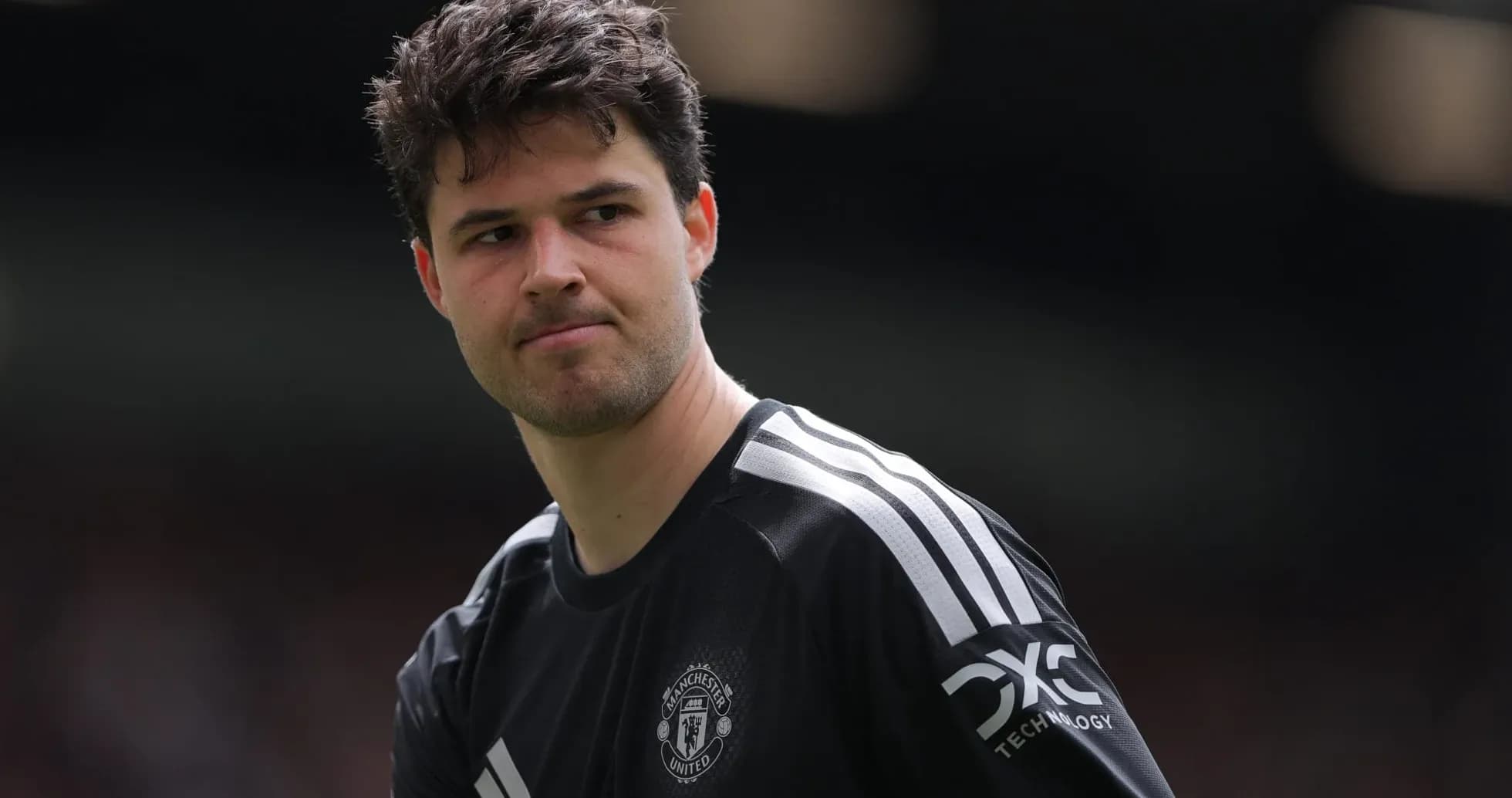 Goalkeeper in Manchester United kit on field