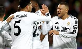 Real Madrid players celebrating a goal