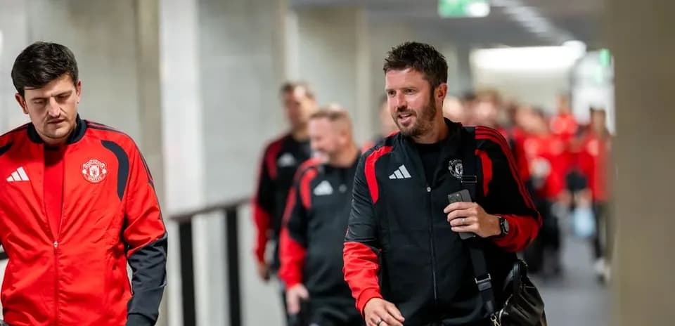 Manchester United players walking through corridor