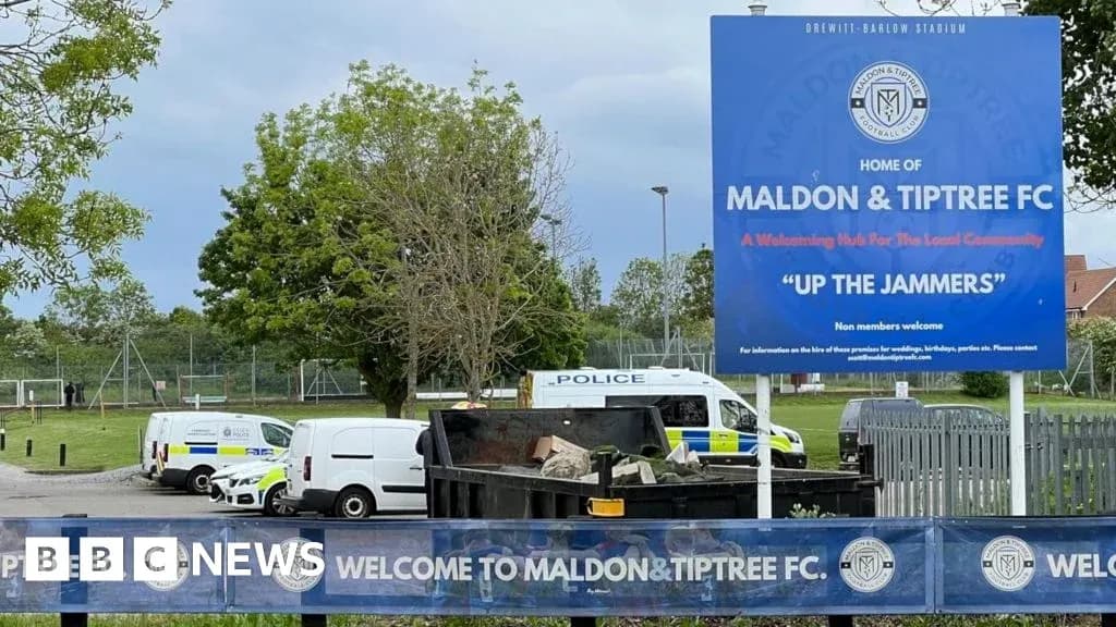 Maldon & Tiptree FC stadium entrance with police vehicles