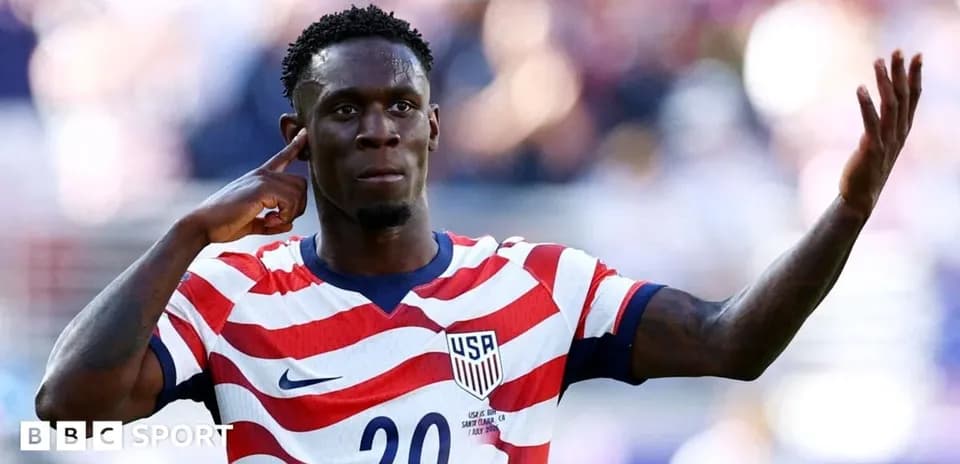 Player celebrating with USA jersey during match