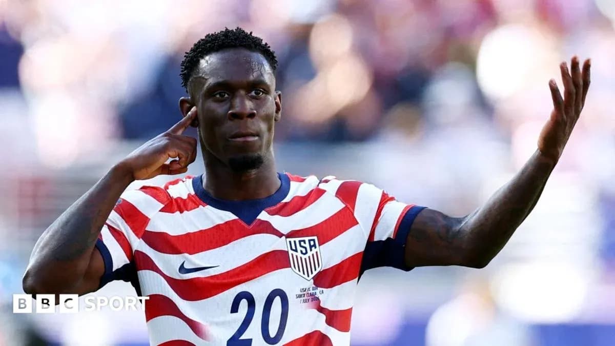 Player celebrating with USA jersey during match