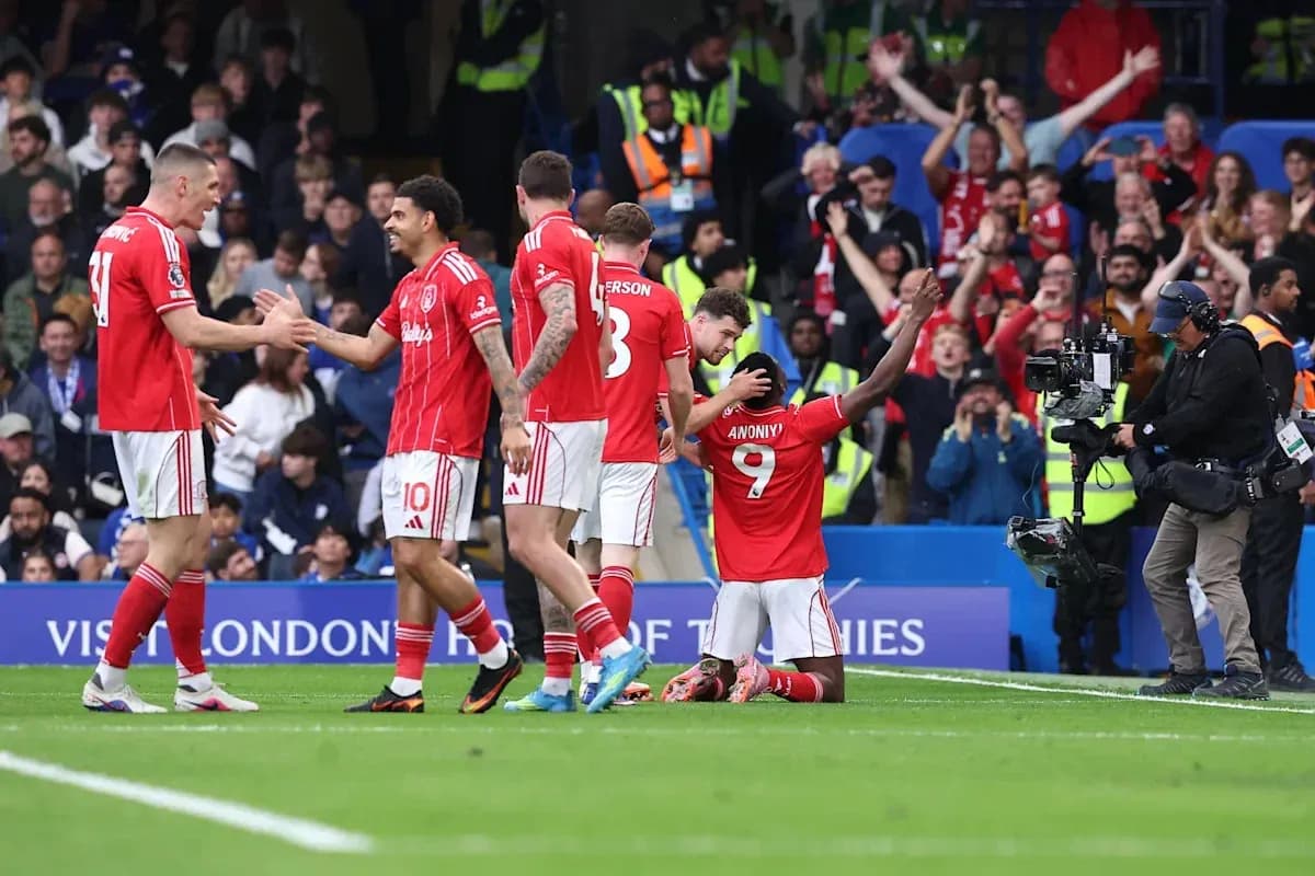 Players celebrating a goal during a match