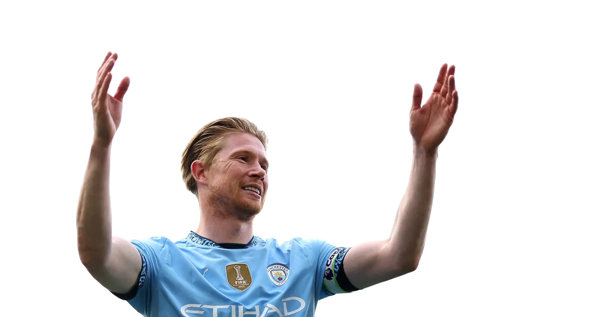 Player celebrating with arms raised on field