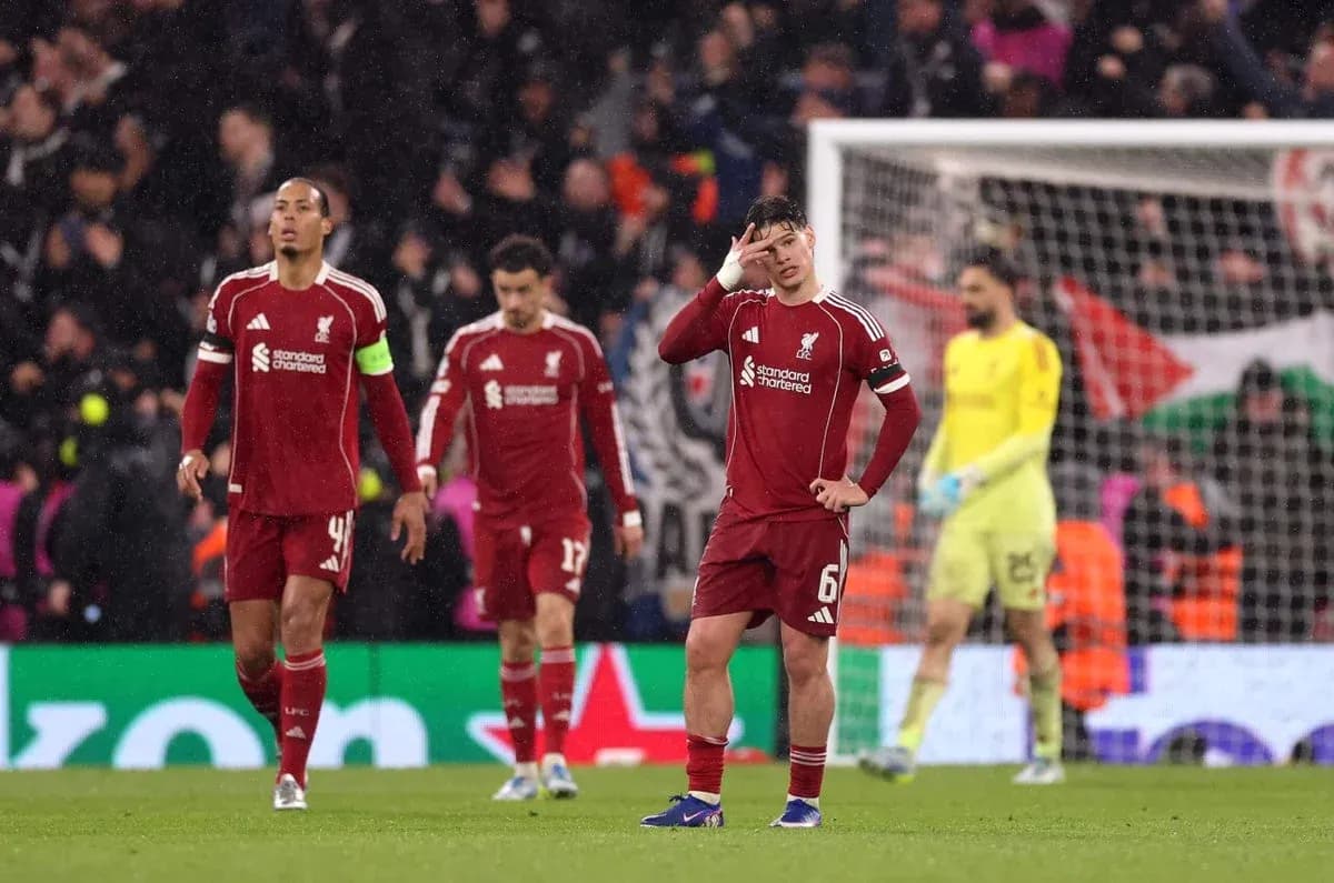 Liverpool players walking off field after match