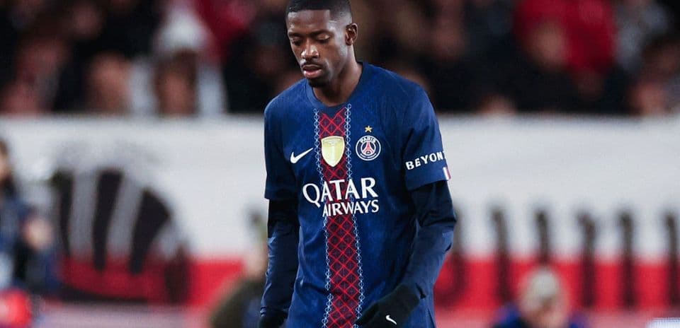Player in PSG kit walking on the field