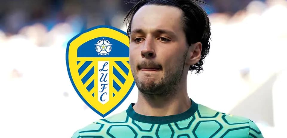 Goalkeeper in green kit with Leeds United logo