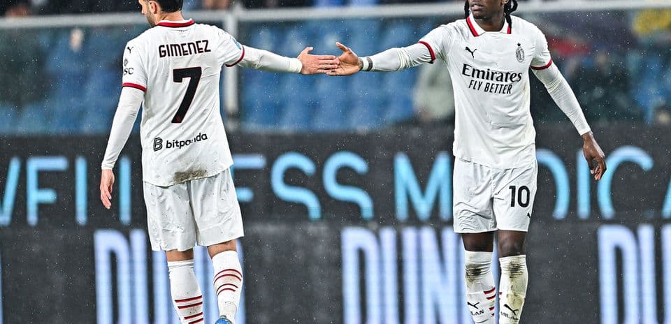 Genoa vs AC Milan players exchanging gestures
