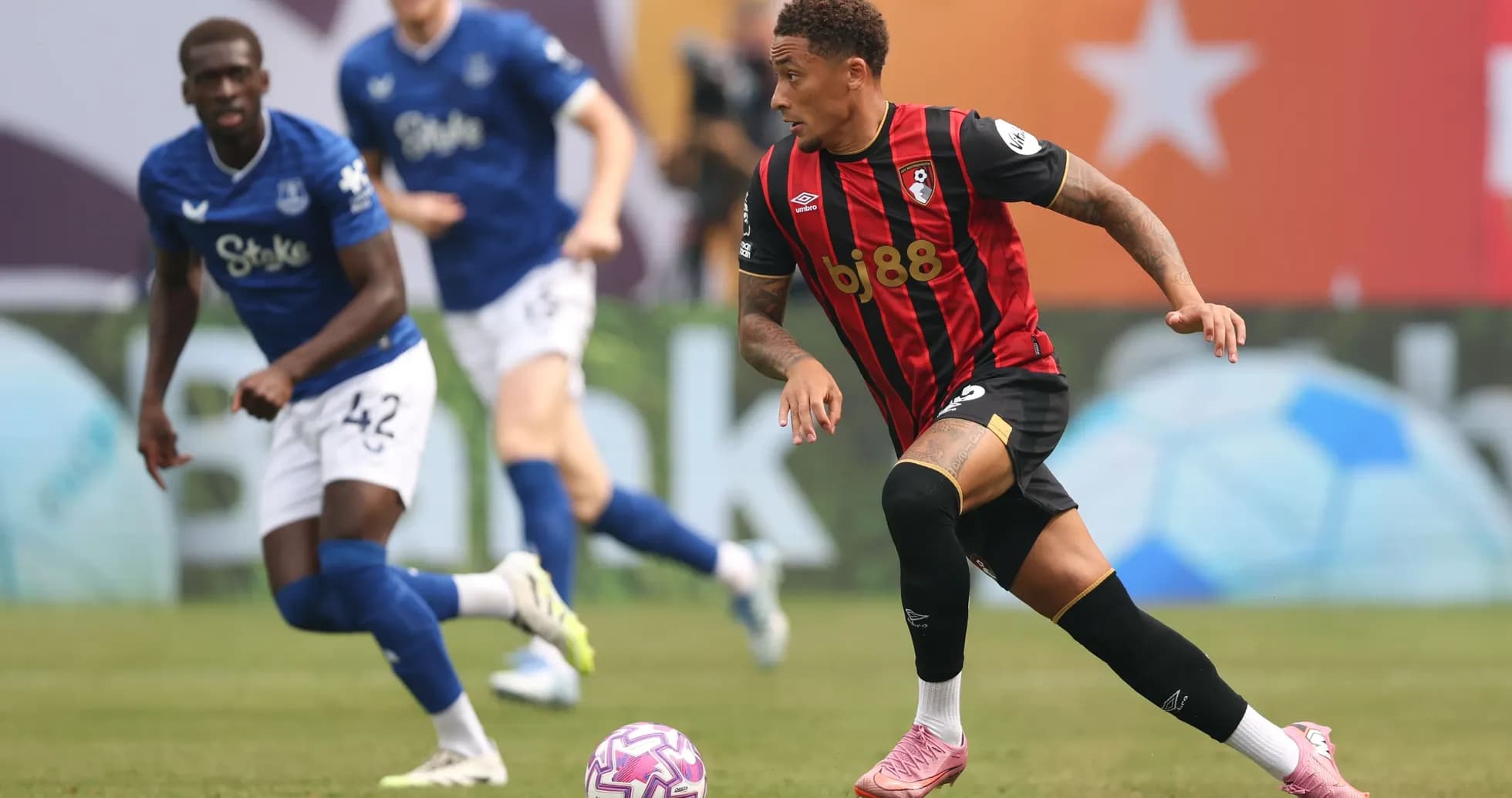Bournemouth player dribbling the ball during match