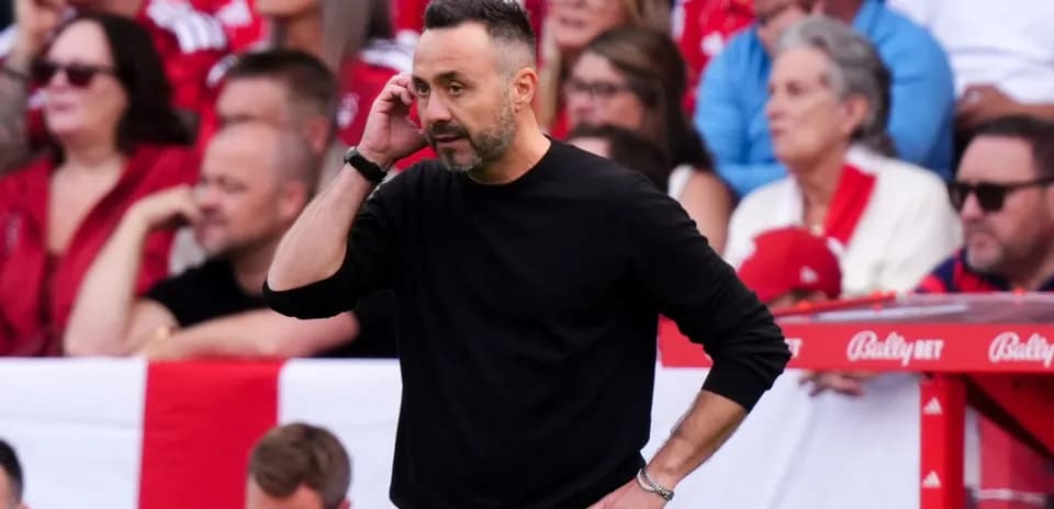 Coach communicating during a match on the sidelines