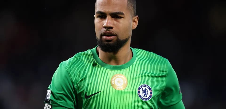 Goalkeeper in green jersey during match