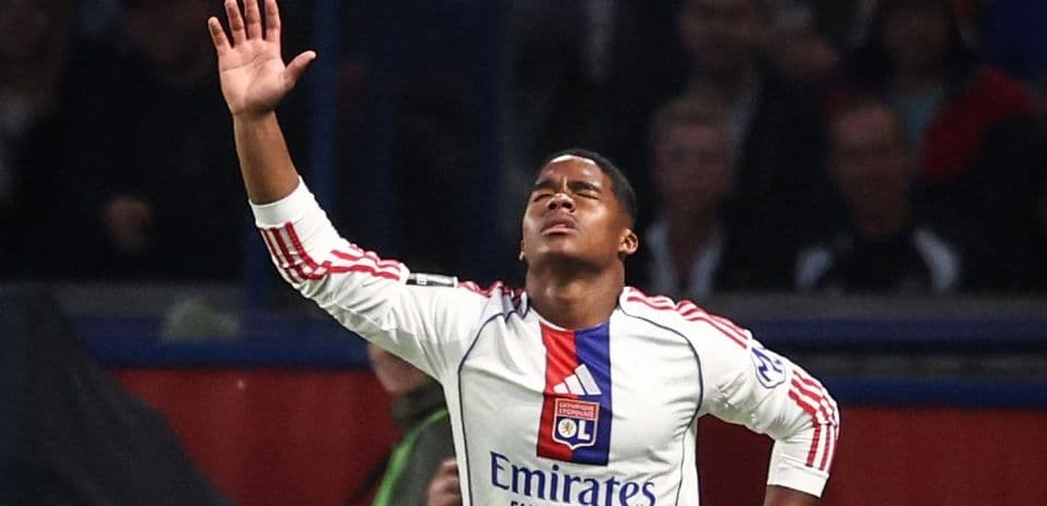 Player celebrating after scoring a goal for Lyon