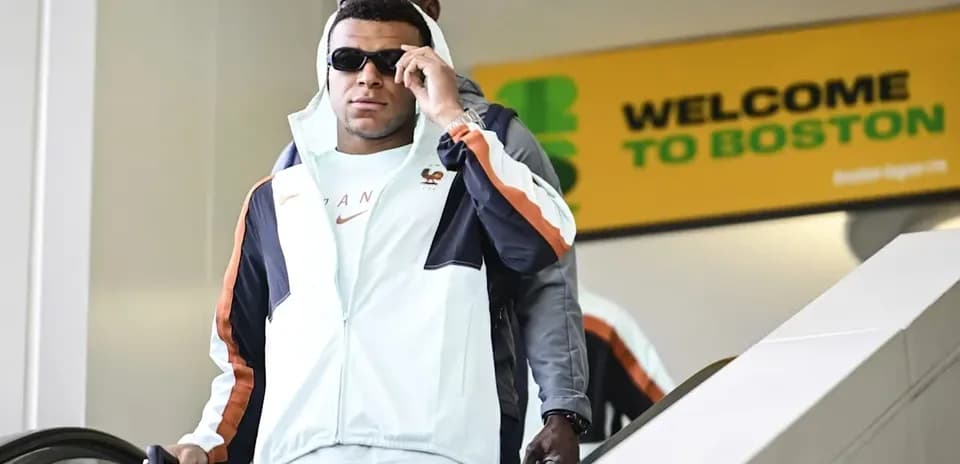 Player arriving at Boston airport with luggage
