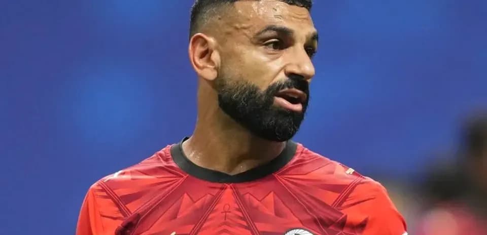 Player in red jersey during football match