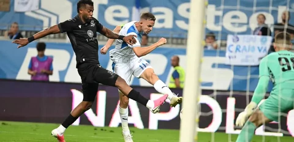 Ararat-Armenia player striking the ball against Craiova