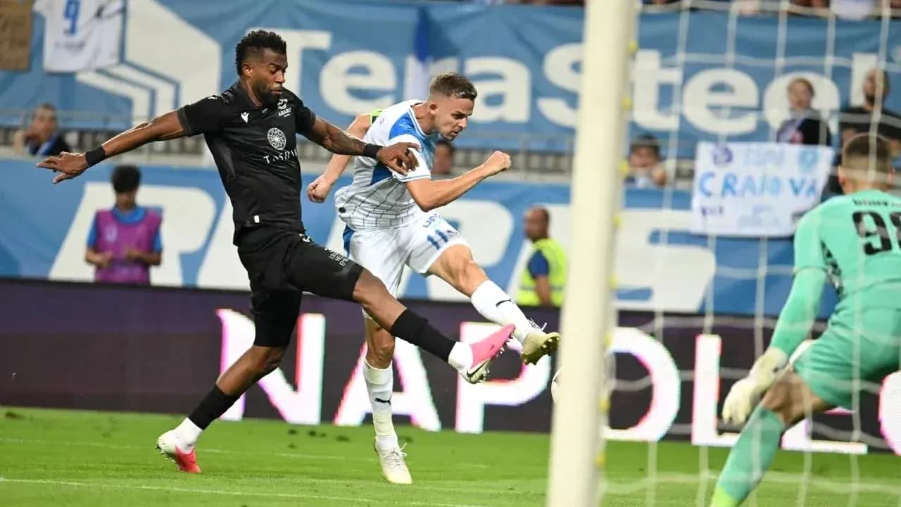 Ararat-Armenia player striking the ball against Craiova