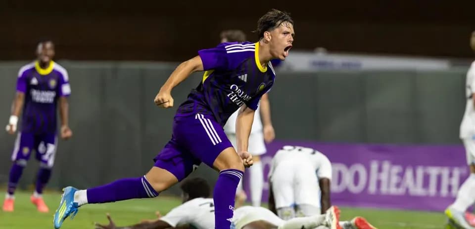 Player celebrating a goal during Crown Legacy match