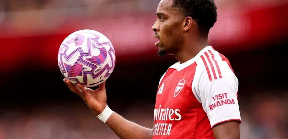 Player holding a soccer ball during match preparation
