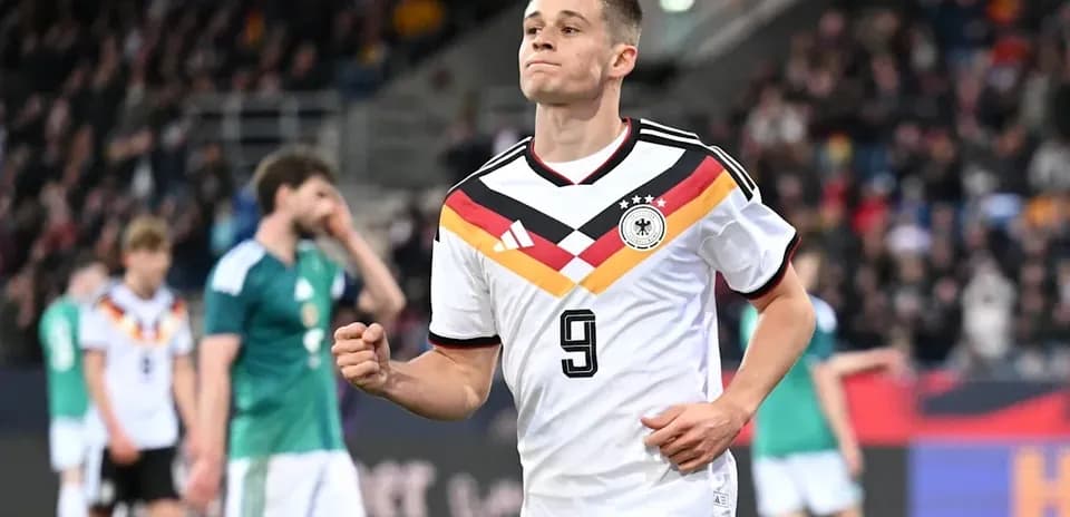 Player in Germany jersey celebrating a goal